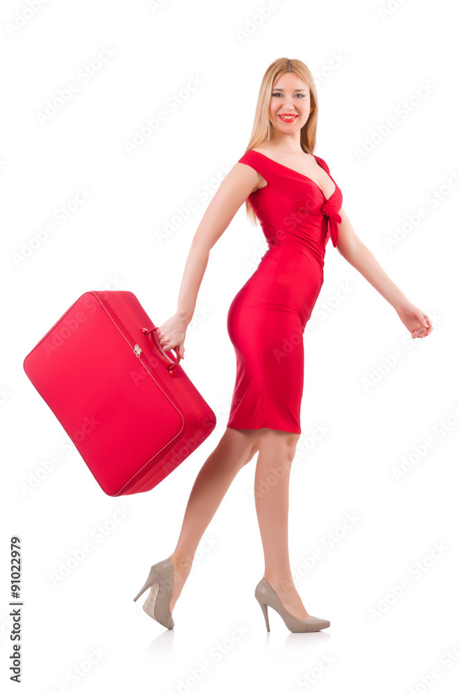 Blondie in red dress with suitcase isolated on white Blondie in red dress with suitcase isolated on white