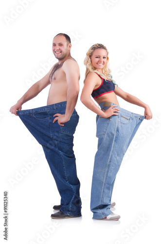 Woman and man loosing weight isolated on white