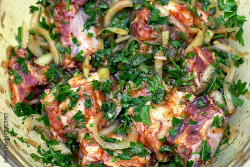 marinated raw  meat with onions and spices, cut into pieces in a