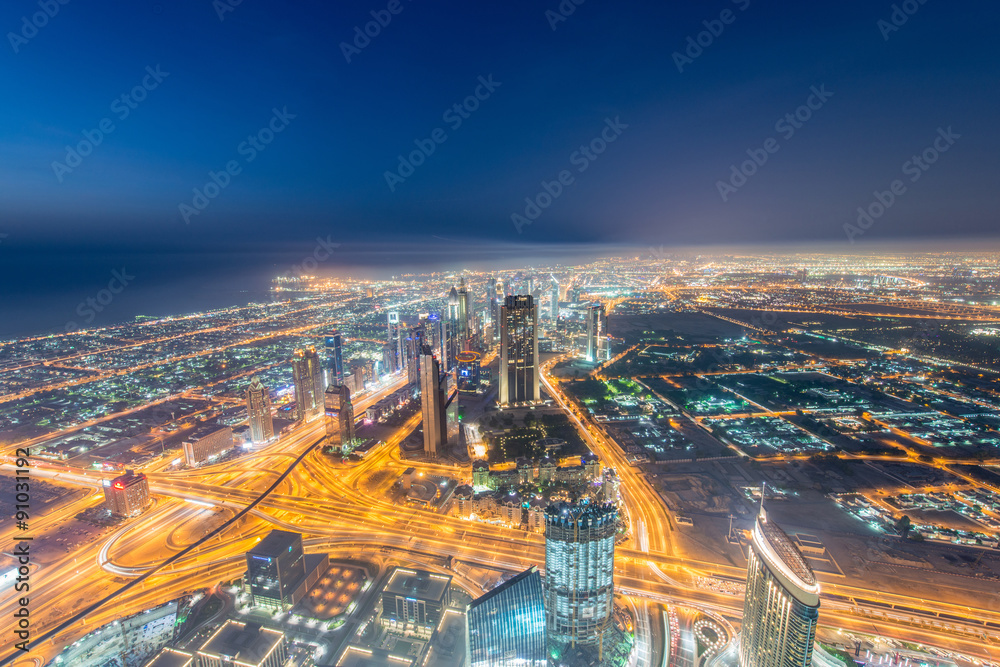 Panorama of night Dubai during sunset