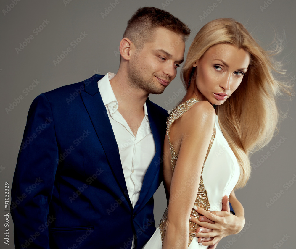 Beautiful wedding couple posing in studio. Beautiful wedding couple posing in studio.
