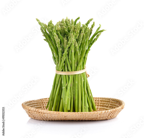 asparagus in the basket on white background