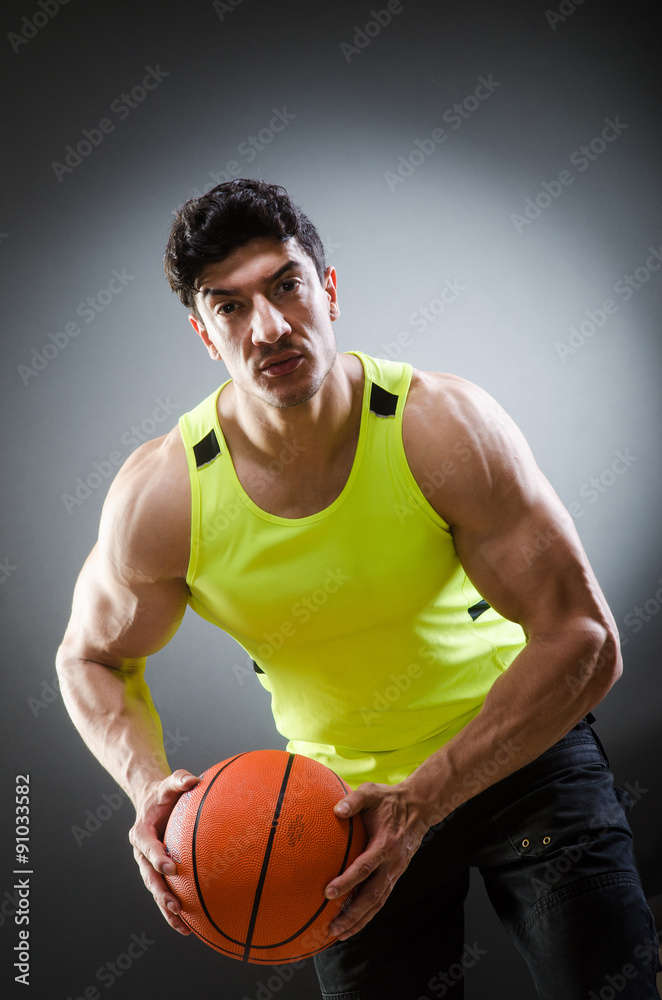 Muscular basketball in sports concept Muscular basketball in sports concept