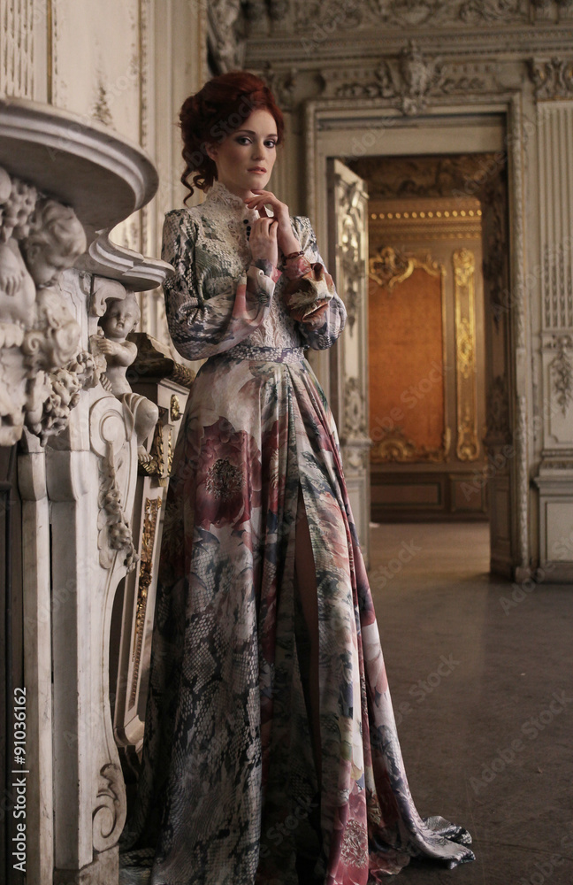beautiful woman standing in the palace room. 