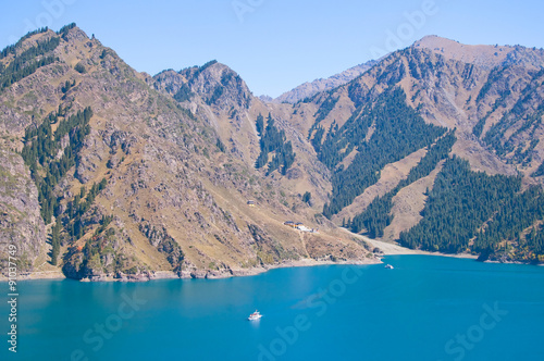 Tianchi Lake(Heaven's Lake) A beautiful lake in Tianshan mountains, Xinjiang, China.Tianchi Lake 's elevation is 1980 meters, 3.5 kilometers long, the deepest place of the lake is 103 meters.