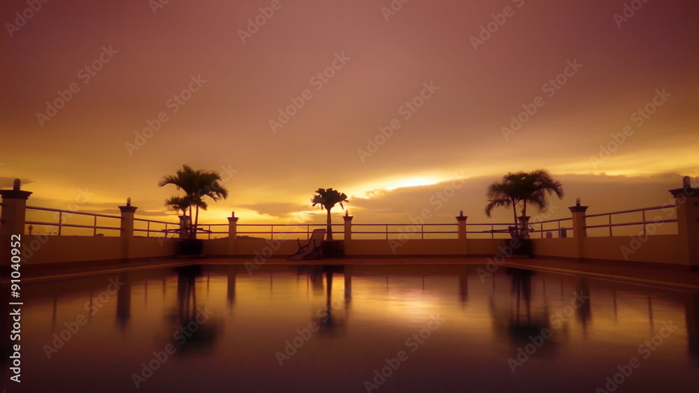 Golden sunset reflected in rippled swimming pool water. Timelapse FullHD 1080p. Golden sunset reflected in rippled swimming pool water. Timelapse FullHD 1080p.