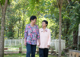 two chinese senior woman in the park