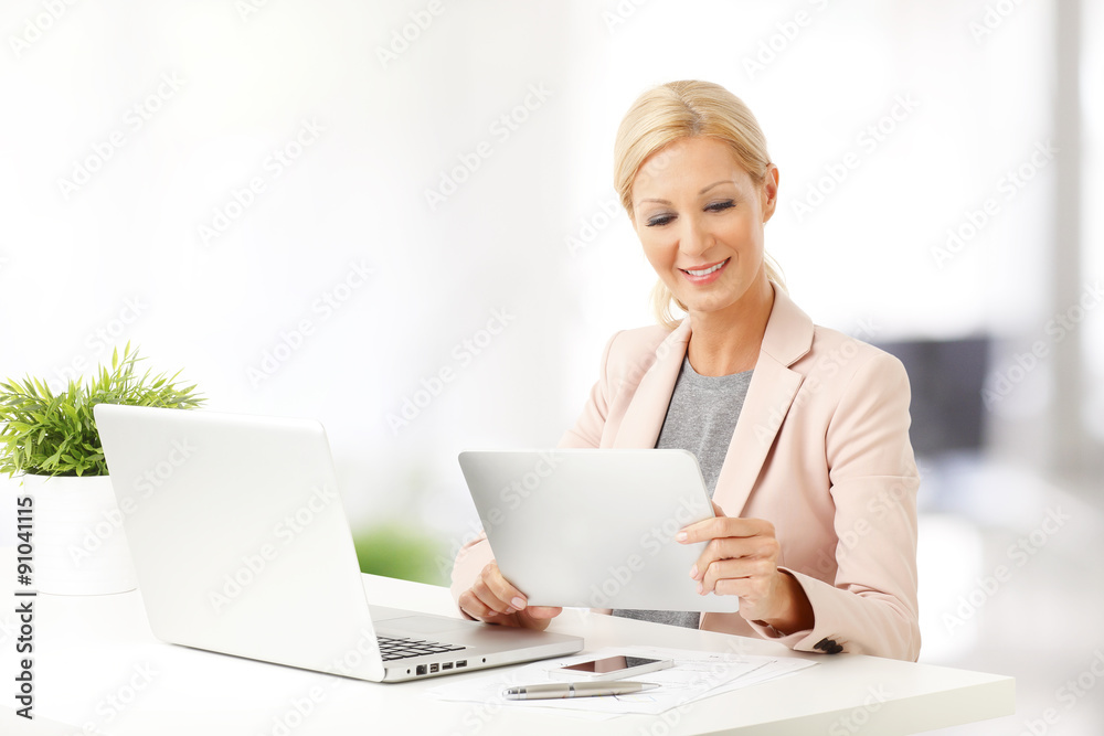 Businesswoman working at office Businesswoman working at office