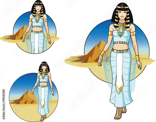 Beautiful Egyptian Queen on desert background with the Pyramids