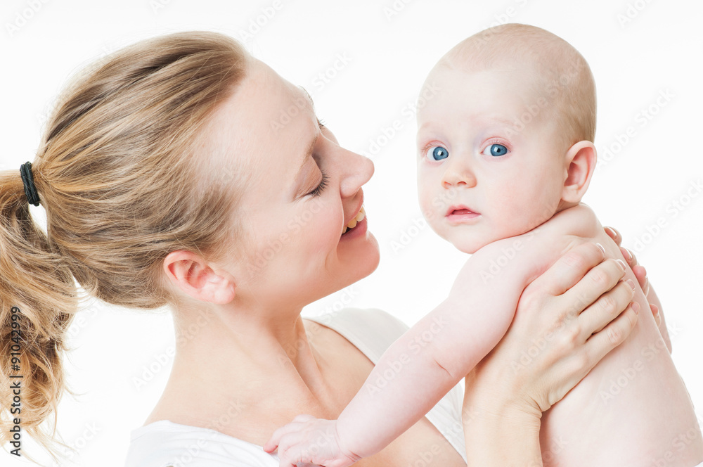 Mother and baby playing and smiling. Happy family. Mother and baby playing and smiling. Happy family.