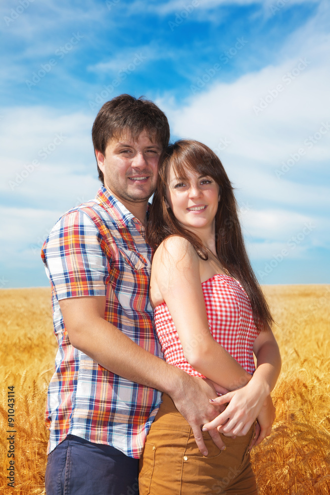 Man and woman on a wheat field Man and woman on a wheat field