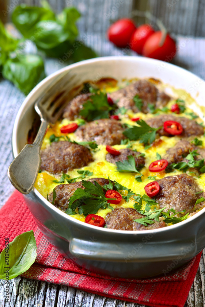 Meatballs baked in omelet. Meatballs baked in omelet.
