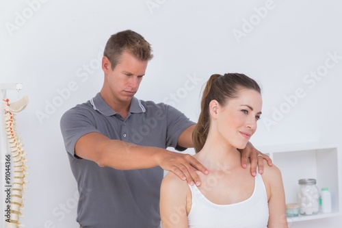 Картината върху платно Doctor examining his patient neck