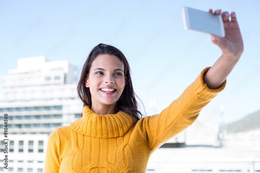 Pretty brunette taking a selfie Pretty brunette taking a selfie