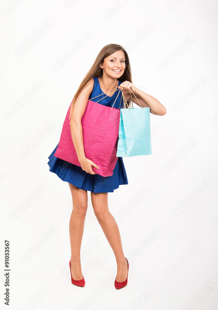 Smiling girl with the shopping bags Smiling girl with the shopping bags