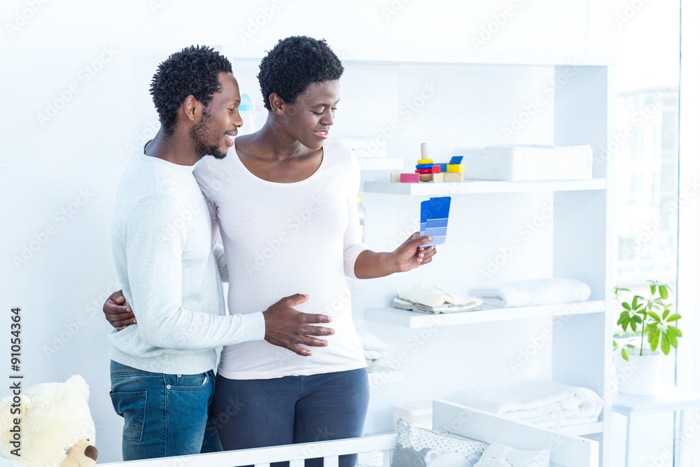 Wife showing color swatches while standing Wife showing color swatches while standing
