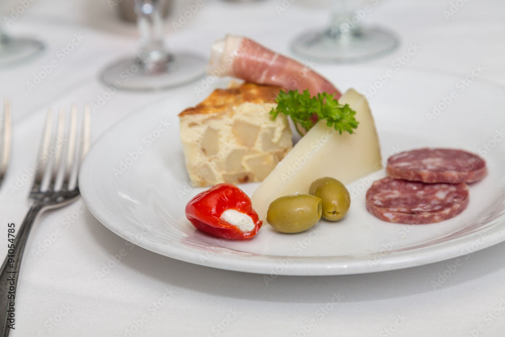 Appetizer Plate of Quiche Meats and Cheeses