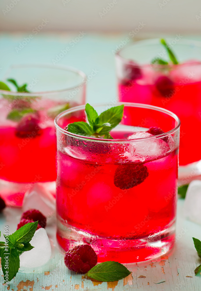 cold drink with raspberry, mint and ice cold drink with raspberry, mint and ice