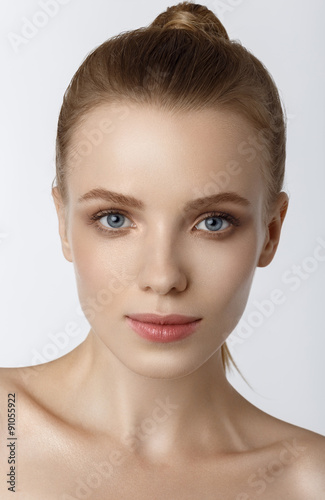 beautiful model lady with natural make-up and blonde hair studio