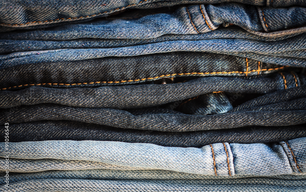 fashionable clothes, pile of jeans fashionable clothes, pile of jeans