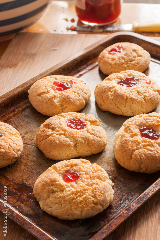 Baking old fashioned jam biscuits or cookies fresh out of the oven Baking old fashioned jam biscuits or cookies fresh out of the oven