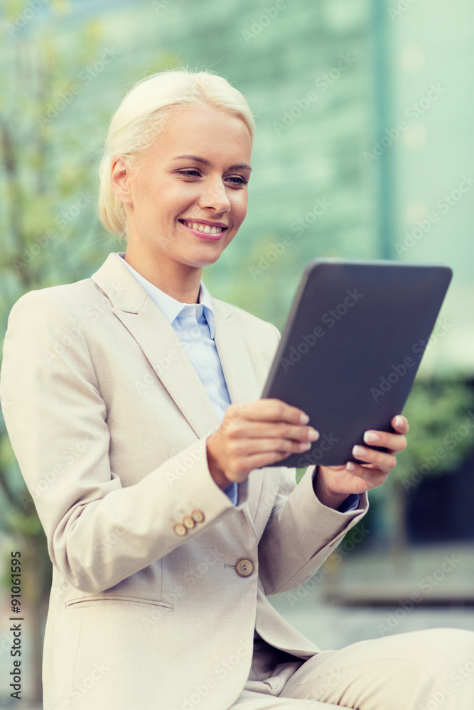 smiling businesswoman with tablet pc outdoors smiling businesswoman with tablet pc outdoors