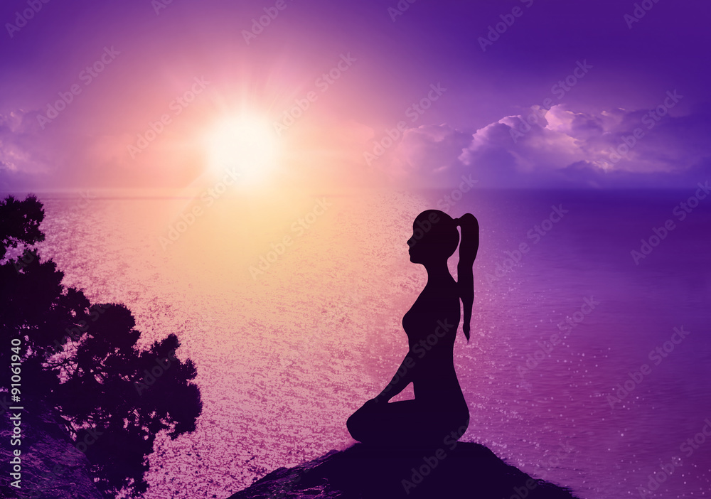    Yoga and meditation. Silhouette of woman on the beach