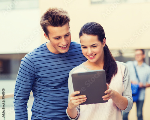 group of smiling students tablet pc computer