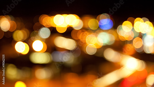 golden bright lights on dark night background