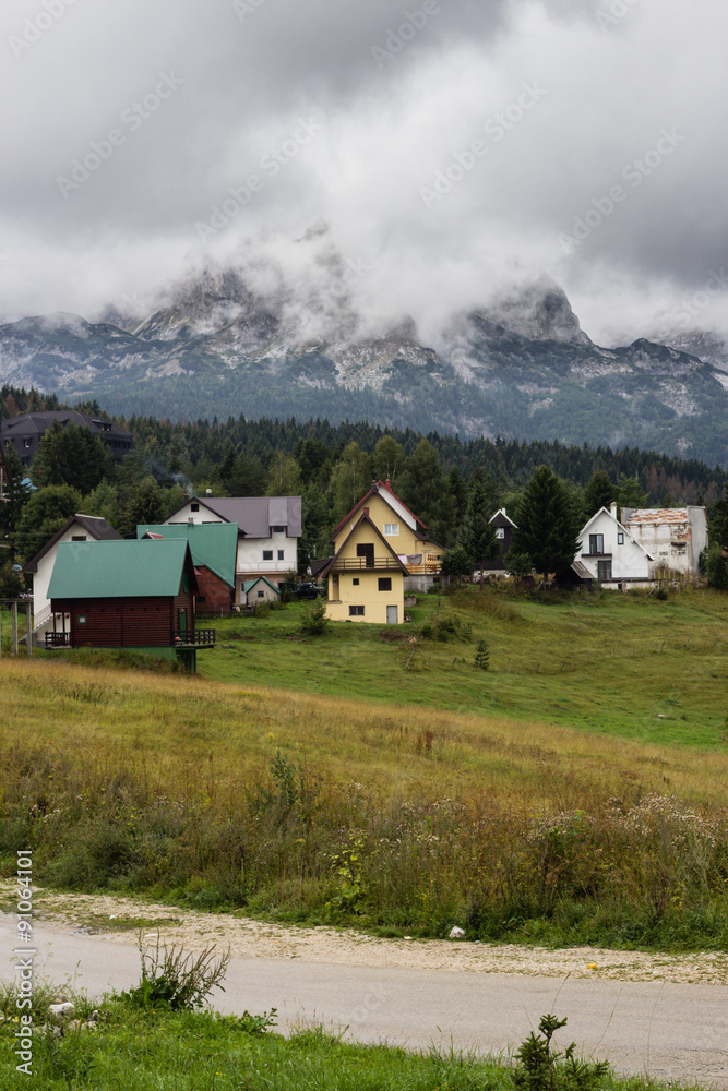 misty landscape in mountains of Dinaric Alps in Durmitor National Park in rainy day