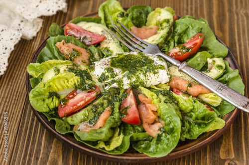 Avocado Salad with Romano tomato salmon and poached egg seasoned dressing green oil  
