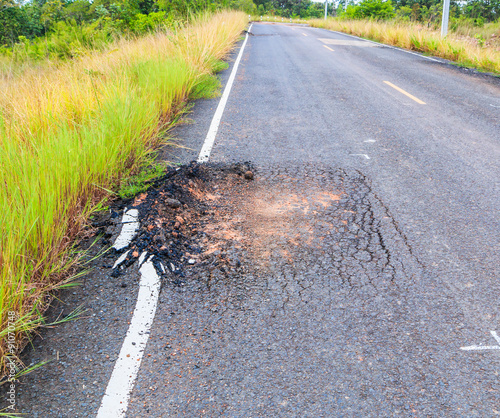Ruined asphalt or destructive road