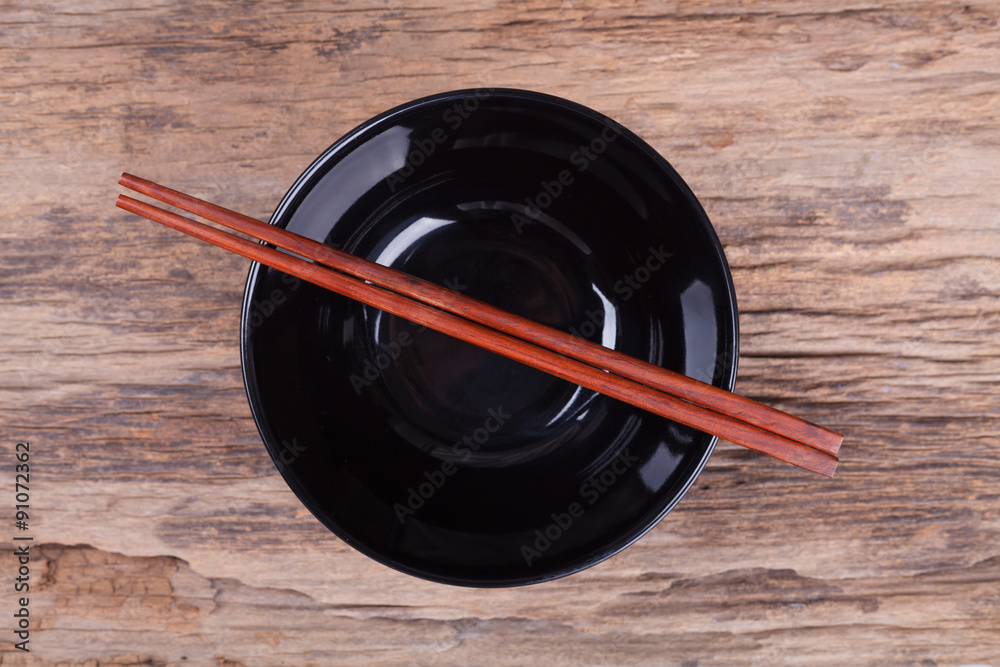 Chopsticks and black bowl Chopsticks and black bowl