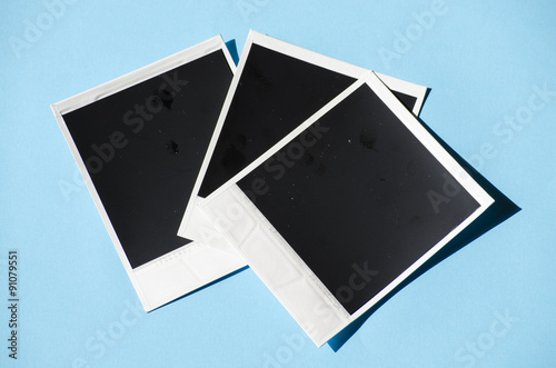 vintage retro instant photo on light blue background