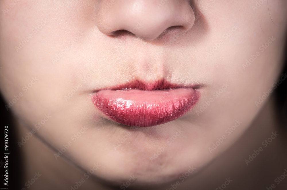 Closeup of pretty young girl's mouth Closeup of pretty young girl's mouth