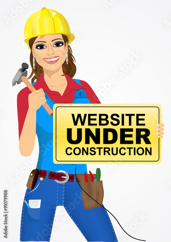 builder woman with hammer