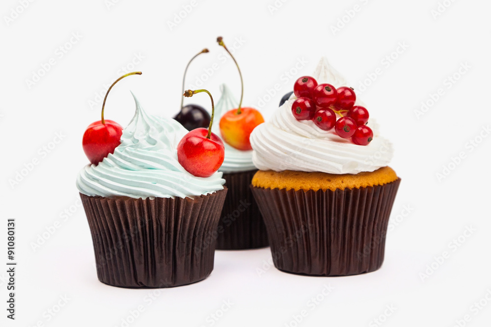 Three cupcakes with fruits