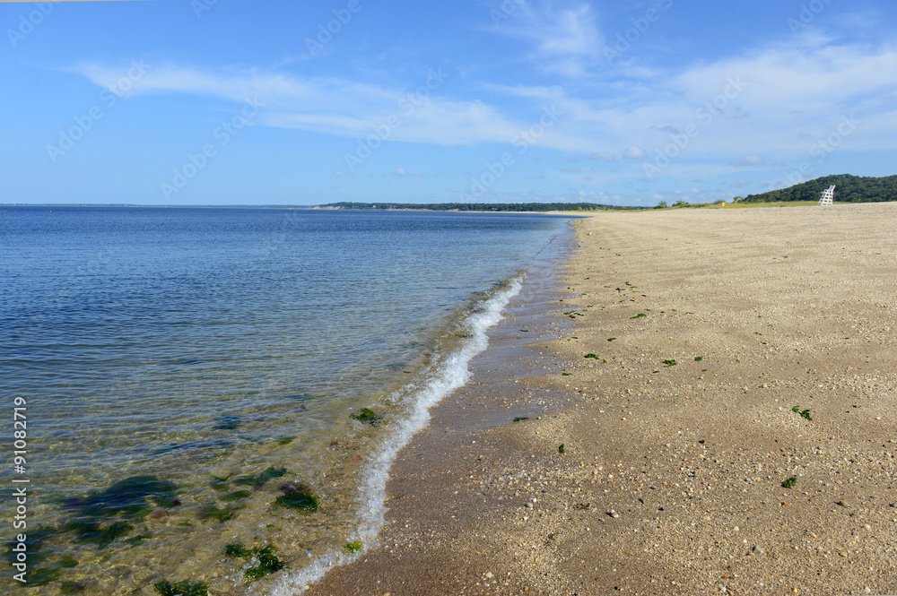 Sand beach on Long Island Sound, with blue skies and no people. New York Sand beach on Long Island Sound, with blue skies and no people. New York