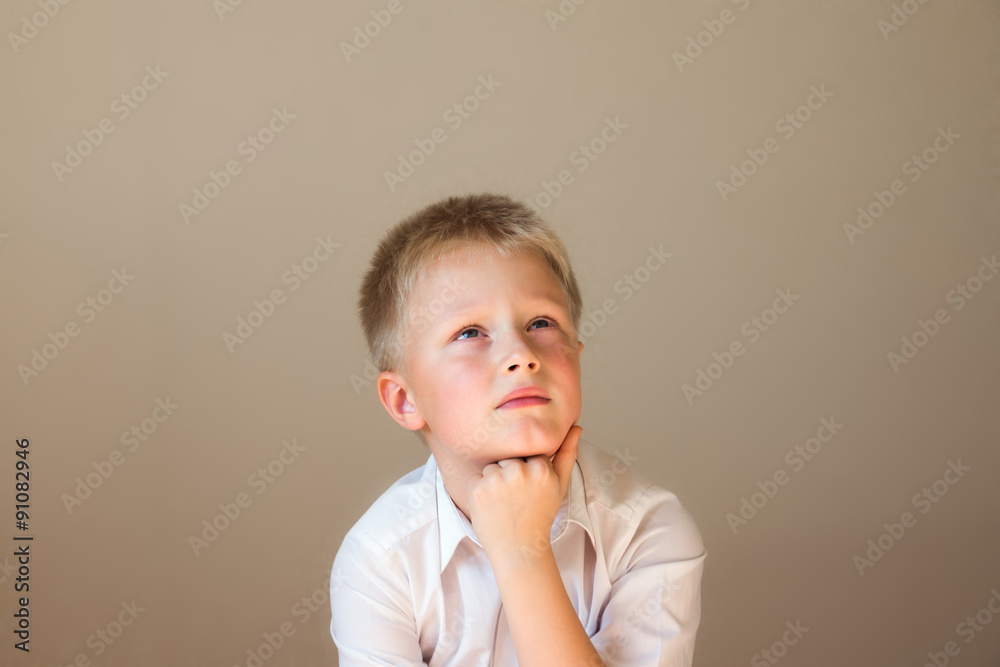 Child (boy) thinking Child (boy) thinking