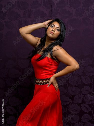 Indian Woman Wearing Beautiful Flowing Sleeveless Dress photo