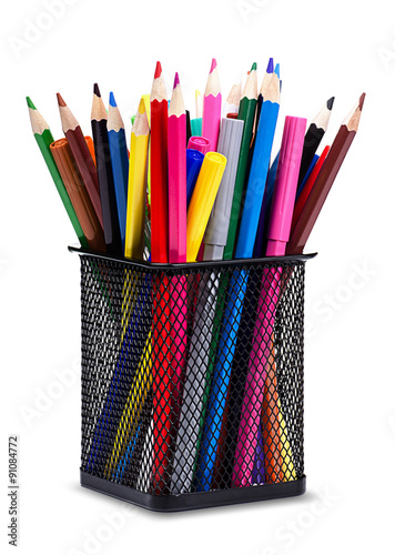 Pencils and markers in metal glass