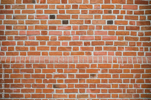 Medieval red brick wall