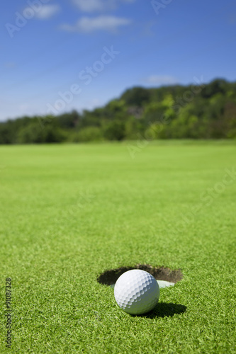Golf ball close to the hole