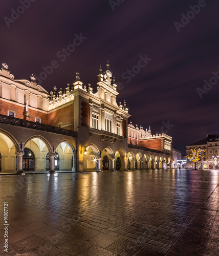 Cloth-hall (Sukiennice) in Krakow beautifully illuminated in the night #91087721