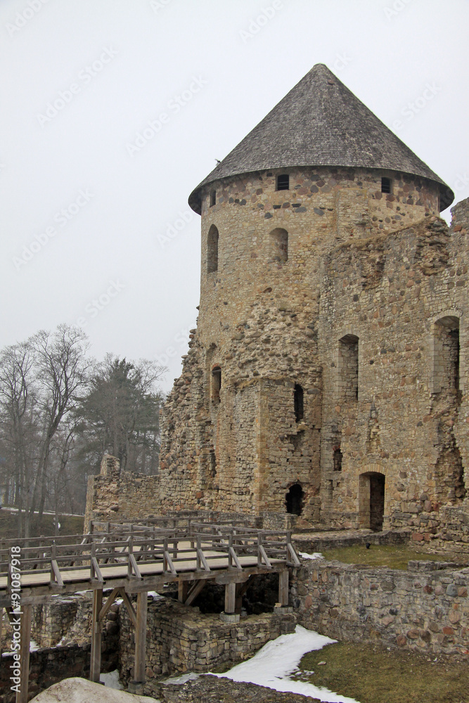 CESIS, LATVIA - MARCH 17, 2012: Ruins of Cesis Castle (or Wenden castle) that is a Livonian castle of 13th century situated in Cesis, Latvia. It was partly destroyed during the Great Northern War.