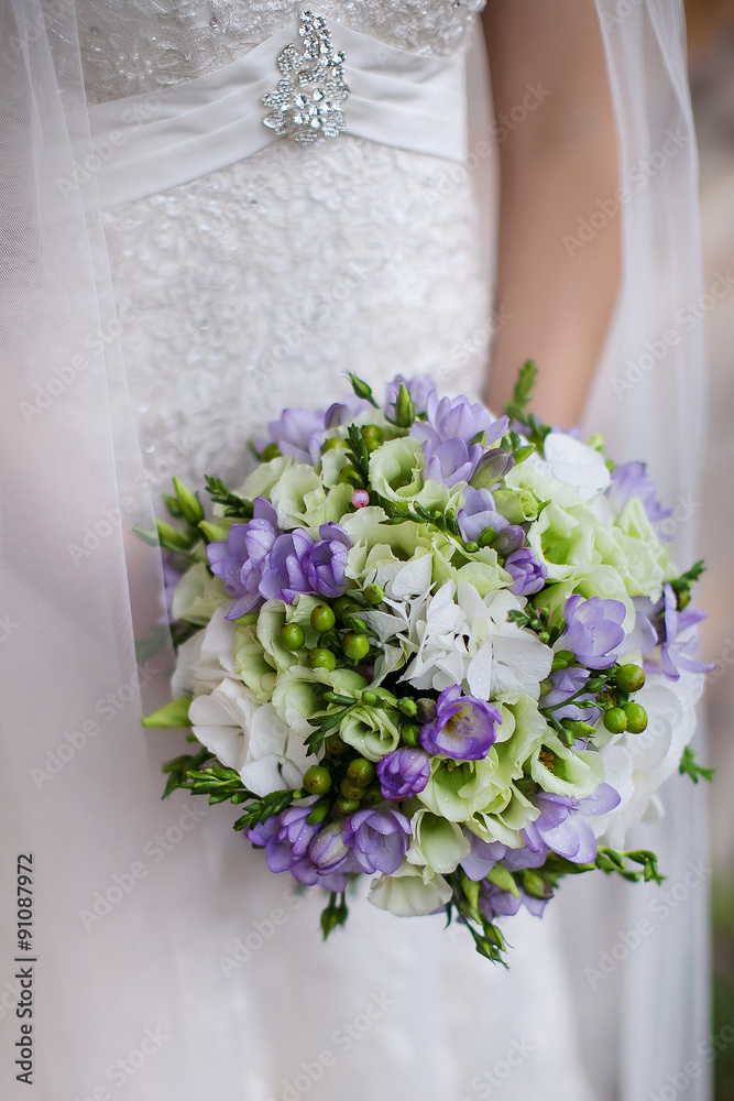 the bride holding a bouquet the bride holding a bouquet