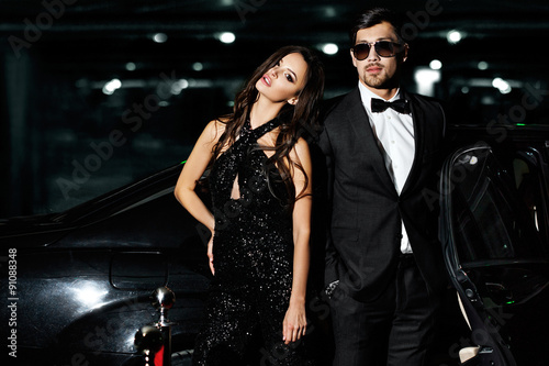 Принти на полотні Sexy couple in the car. Hollywood stars.