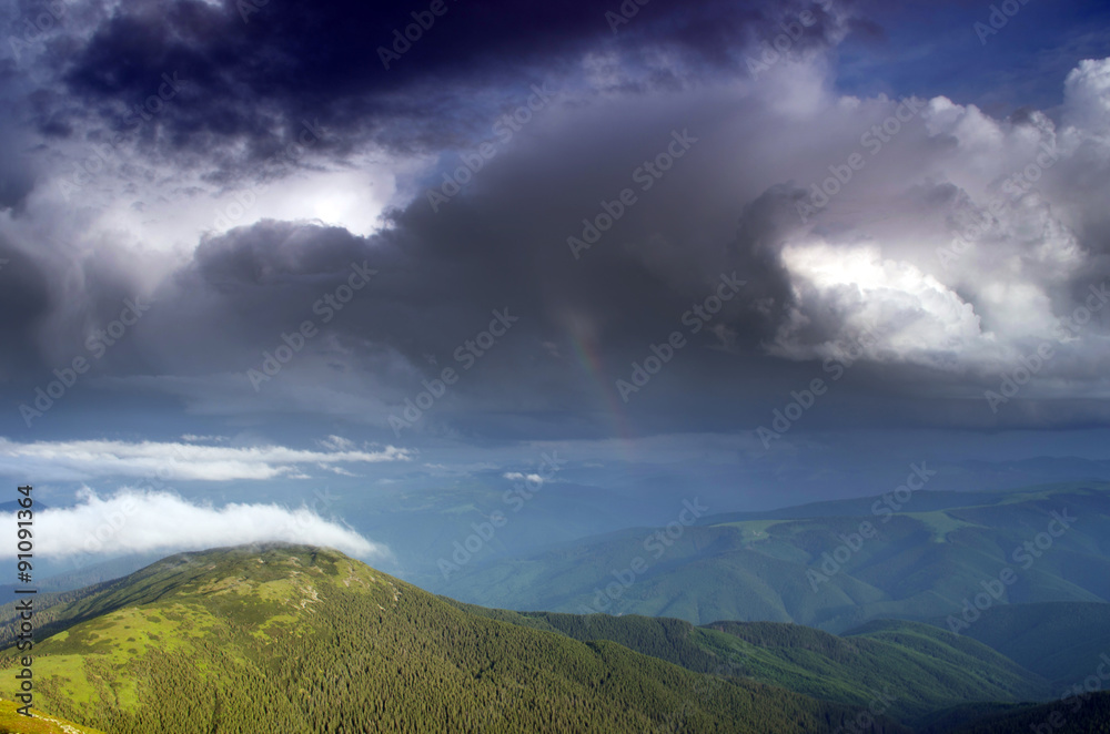 evening mountain plateau landscape with rainbow(Carpathian, Ukra