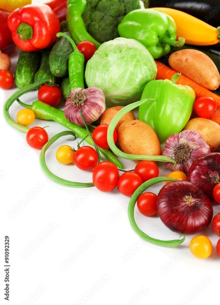 Heap of fresh vegetables isolated on white