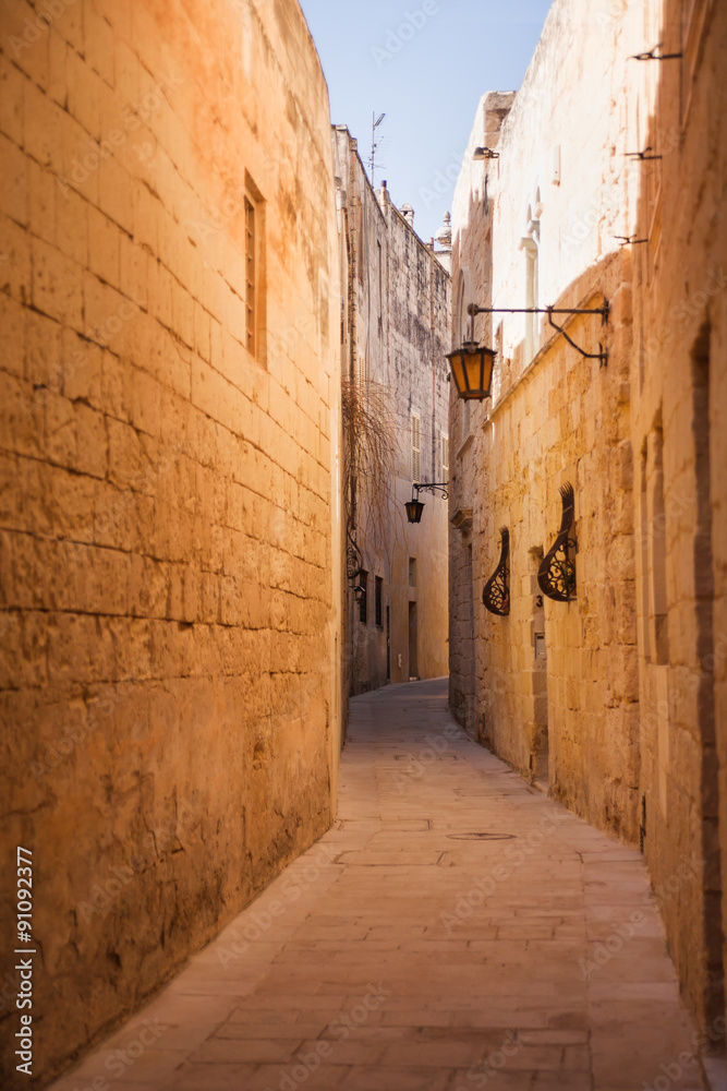 Ancient narrow street in Mdina, Malta.